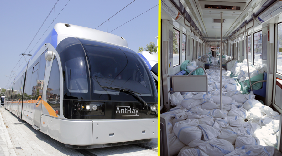 Tramvay yolcudan önce kum torbası taşıyor